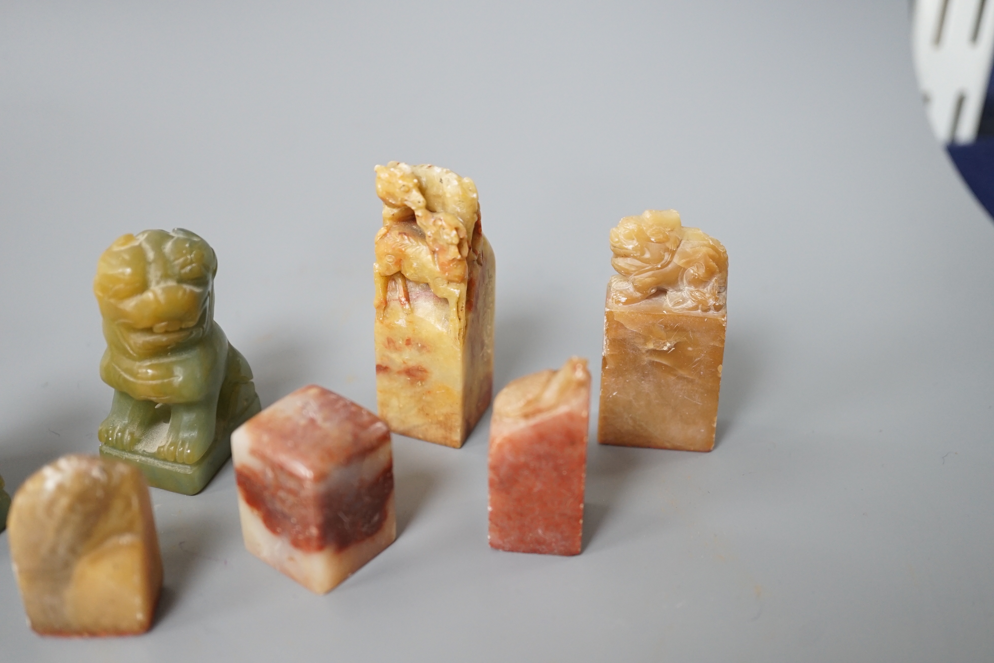 A selection of five Chinese mixed stone seals together with a pair of small jadeite dog figures (7), largest 5.5cm